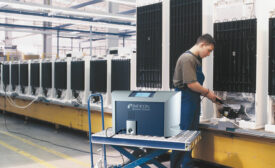 A sniffer probe checks under the hood for A/C refrigerant leaks. Source: Inficon