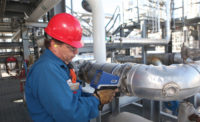 Test in-service on hot pipes with a handheld XRF. Source: Olympus