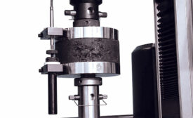 Compression testing on a cylindrical specimen.