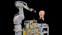 Automation: A FANUC P-40iA Robot Paints a Guitar