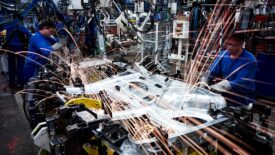 Welders in car factory